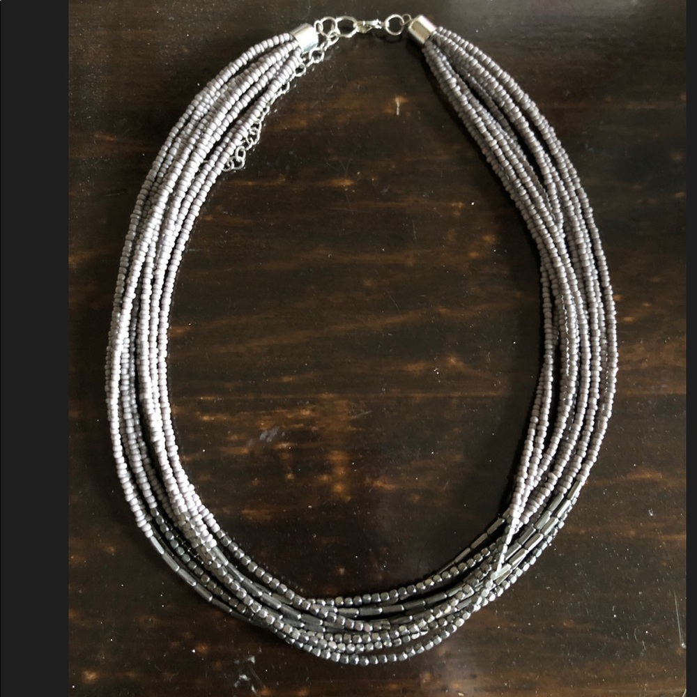 Silver colored beaded necklace